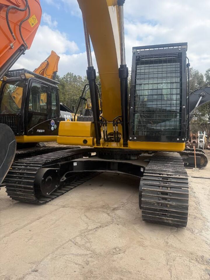 2024 Caterpillar 323 crawler excavator, rear-quarter view