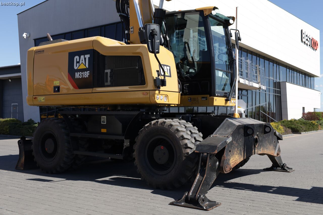 2016 Caterpillar M318F wheel excavator side view 2016 Caterpillar M318F wheel excavator side view