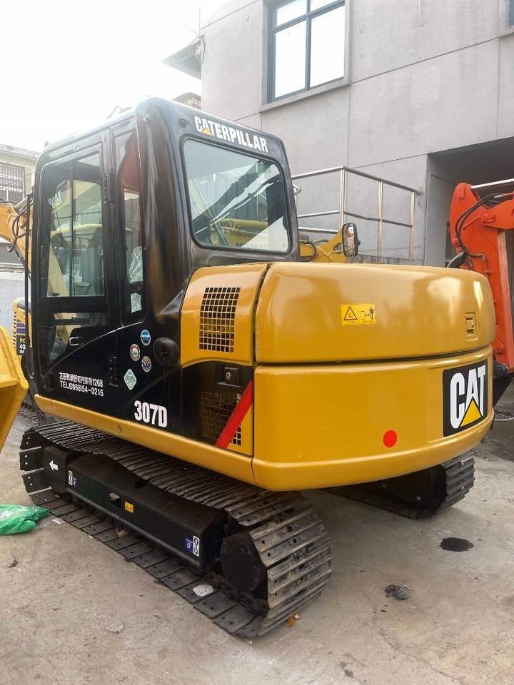 2020 Caterpillar 307D mini excavator, rear three-quarter view 2020 Caterpillar 307D mini excavator, rear three-quarter view