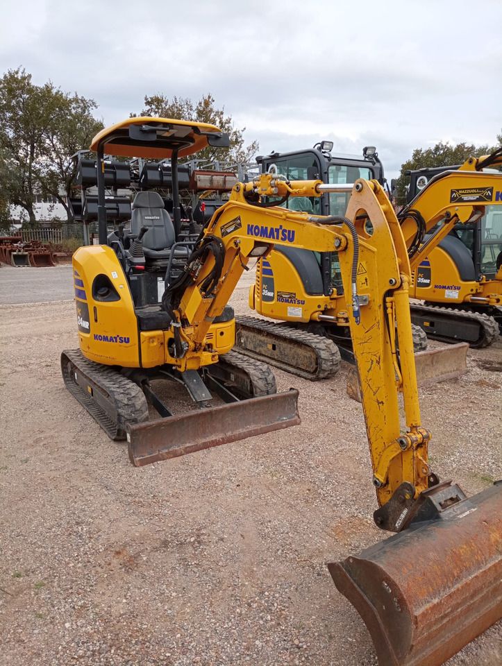 2022 Komatsu PC24MR-5 mini excavator, front three-quarter view 2022 Komatsu PC24MR-5 mini excavator, front three-quarter view