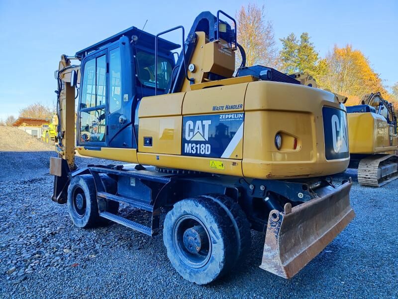 2014 Caterpillar M318D MH wheel excavator, rear three-quarter view