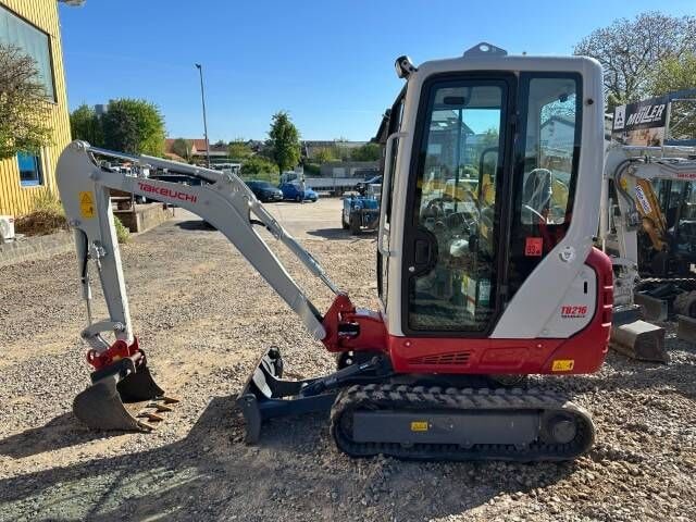 2023 Takeuchi TB216 V0 mini excavator, side view 2023 Takeuchi TB216 V0 mini excavator, side view