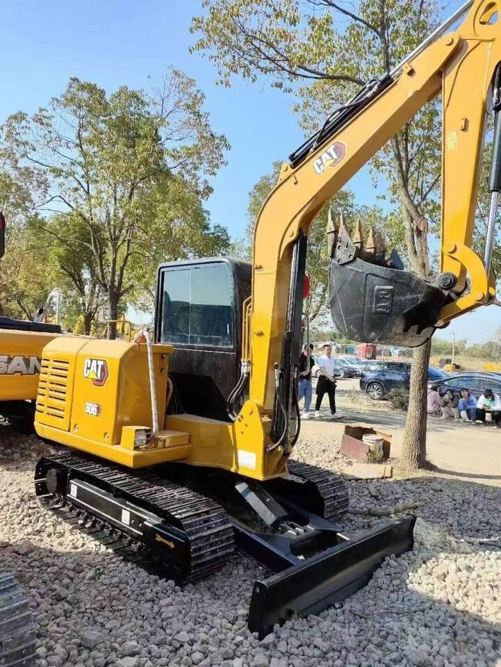 2025 Caterpillar 306 mini excavator, rear three-quarter view 2025 Caterpillar 306 mini excavator, rear three-quarter view