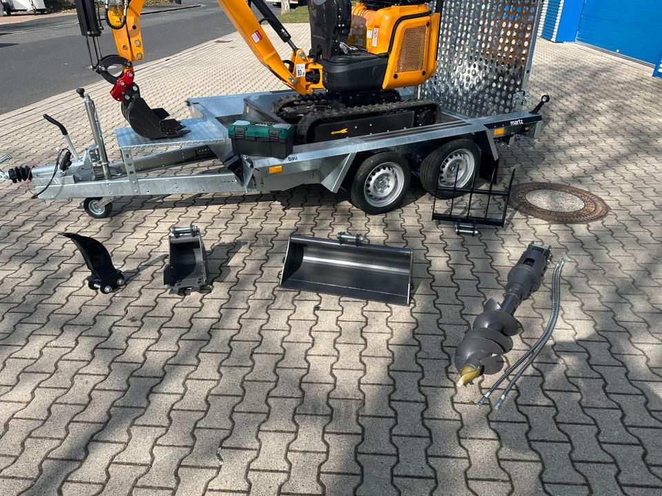 Berger Kraus BK1350JSR mini excavator on trailer with attachments