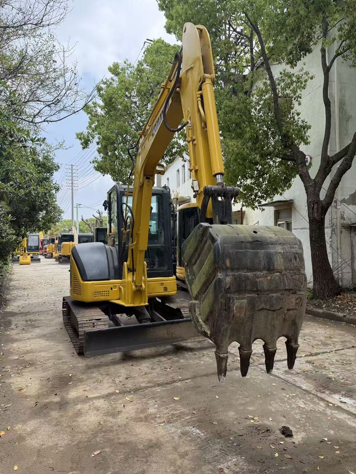 2012 Komatsu PC-55MR mini excavator, front view with bucket 2012 Komatsu PC-55MR mini excavator, front view with bucket