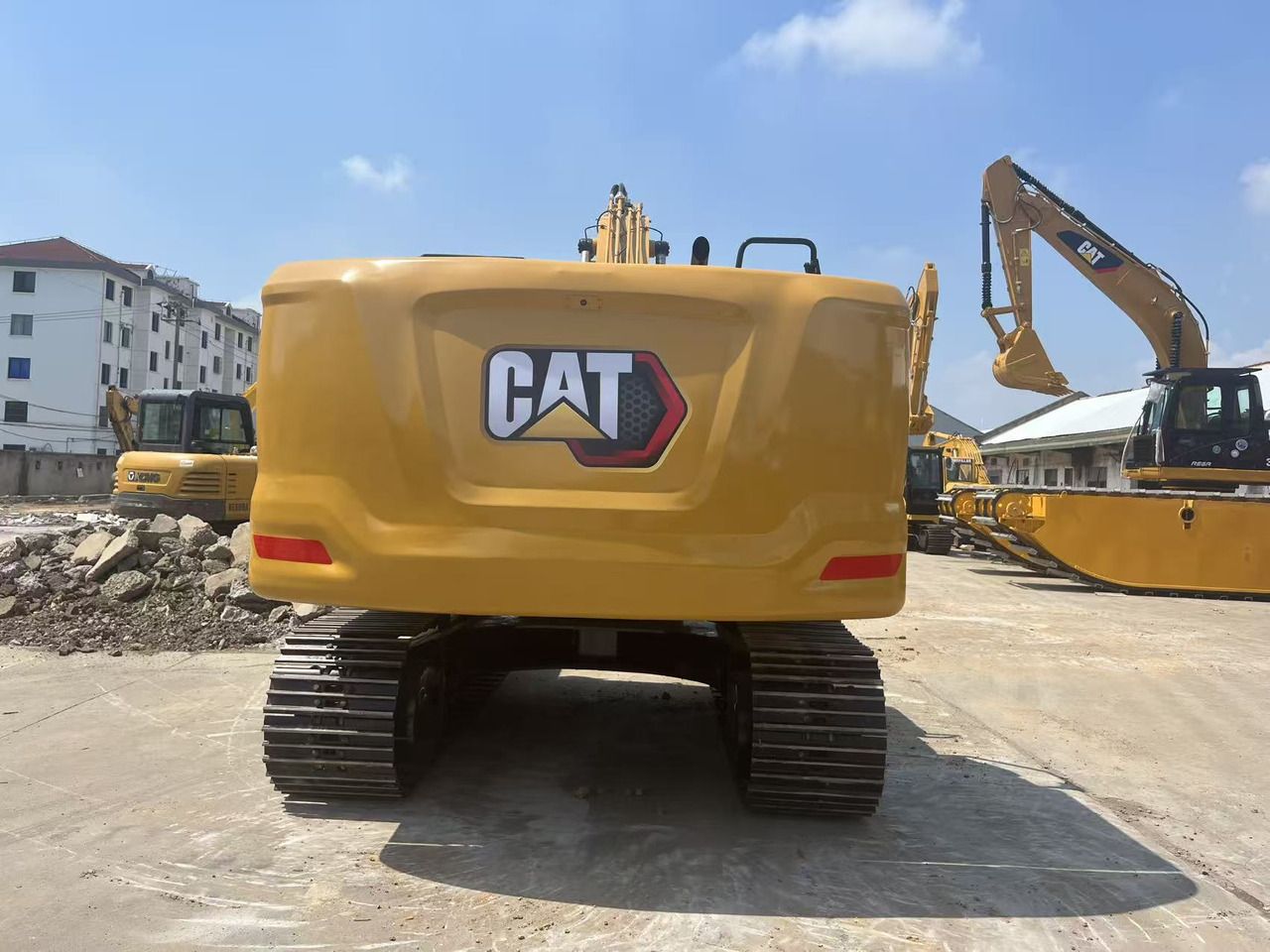 2023 Caterpillar 320GC crawler excavator, rear view 2023 Caterpillar 320GC crawler excavator, rear view