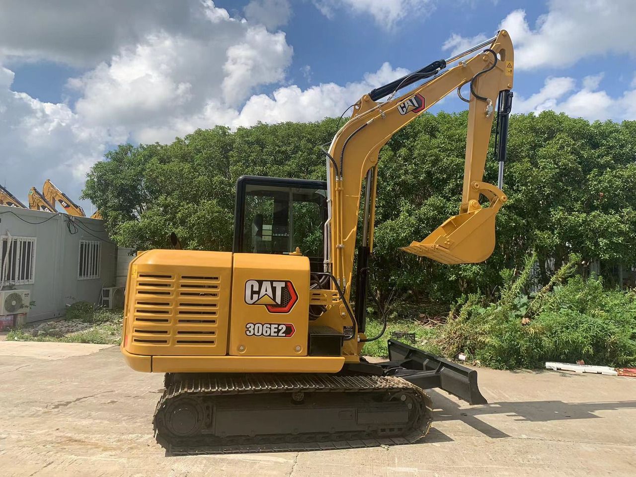 2023 Caterpillar 306E2 mini excavator, side view 2023 Caterpillar 306E2 mini excavator, side view