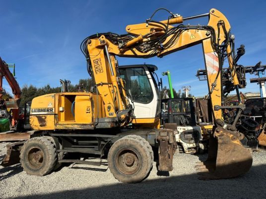 2006 Liebherr A314 Litronic wheel excavator, side view 2006 Liebherr A314 Litronic wheel excavator, side view