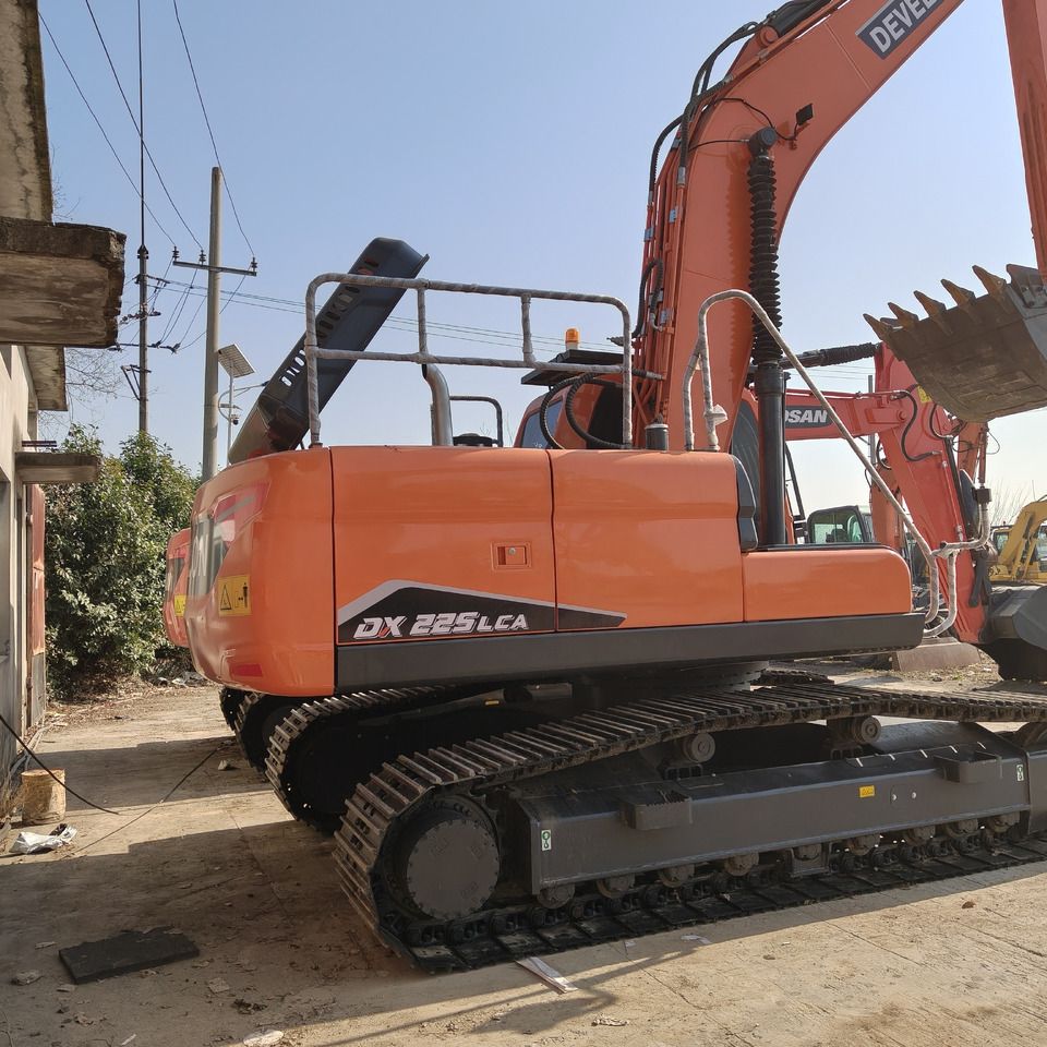 2024 Doosan DX225LCA crawler excavator rear three-quarter view 2024 Doosan DX225LCA crawler excavator rear three-quarter view