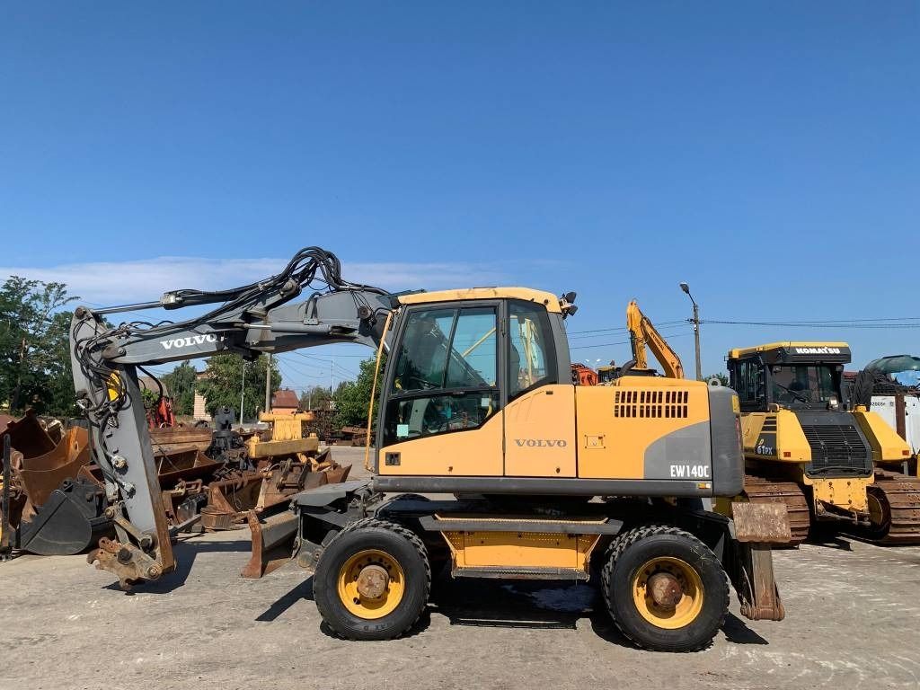 2011 Volvo EW140C wheel excavator, side view 2011 Volvo EW140C wheel excavator, side view
