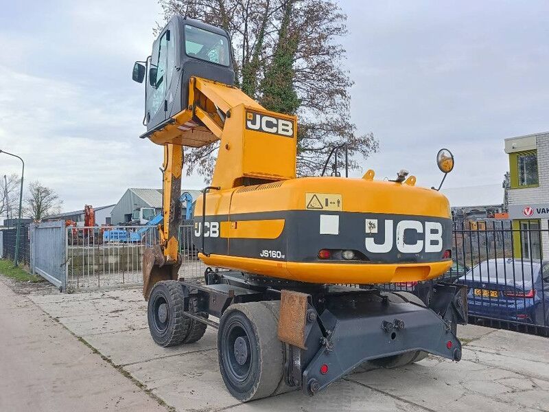 2011 JCB JS160W material handler, rear three-quarter view 2011 JCB JS160W material handler, rear three-quarter view