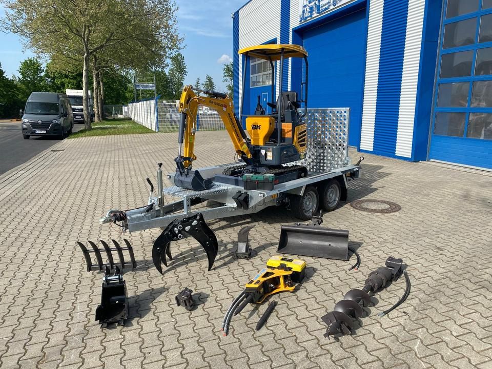 Berger Kraus BK1250JS mini excavator on trailer with attachments Berger Kraus BK1250JS mini excavator on trailer with attachments