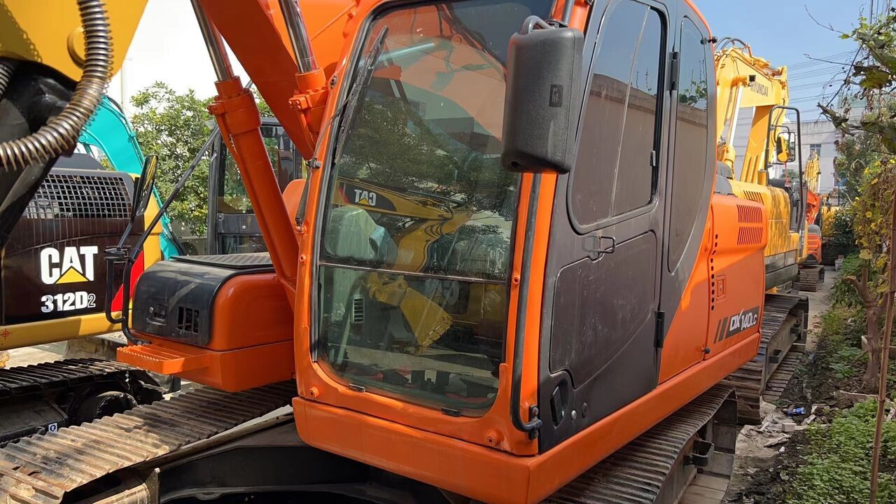 2023 Doosan DX140LC crawler excavator, side view of the cab