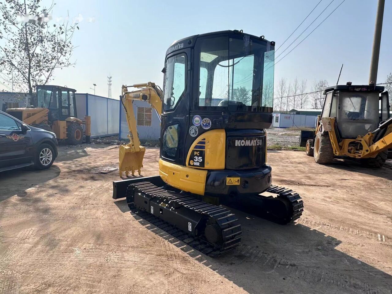 2021 Komatsu PC35 MR mini excavator, rear three-quarter view 2021 Komatsu PC35 MR mini excavator, rear three-quarter view