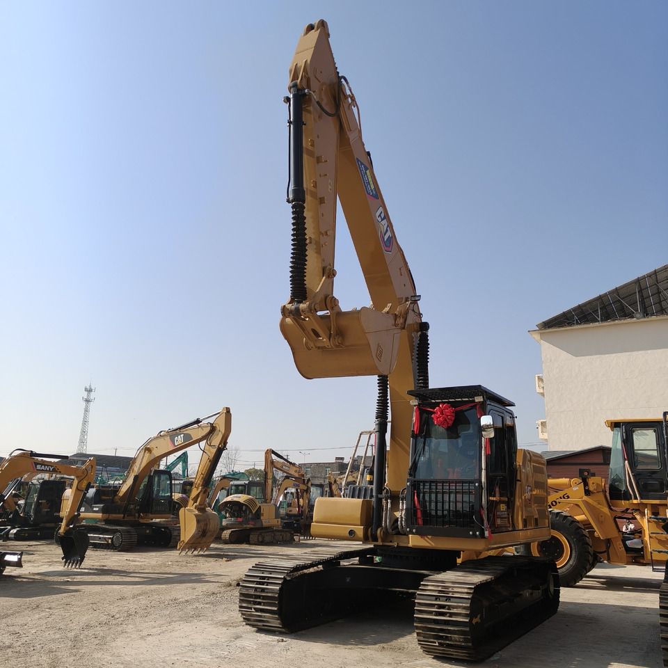 2024 Caterpillar 323GC crawler excavator, front three-quarter view 2024 Caterpillar 323GC crawler excavator, front three-quarter view