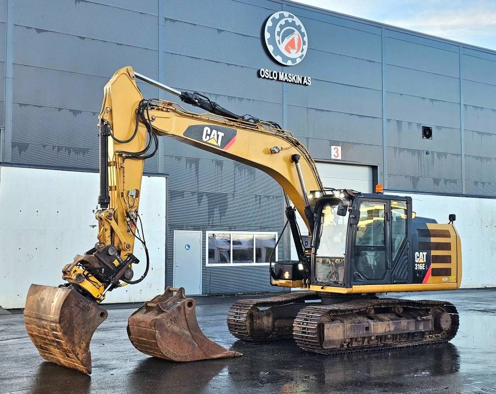 2012 Caterpillar 316EL crawler excavator, side profile view 2012 Caterpillar 316EL crawler excavator, side profile view