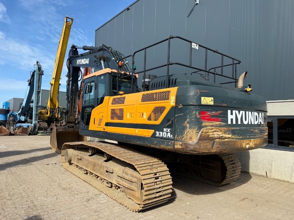2021 Hyundai HX330A L crawler excavator, rear three-quarter view