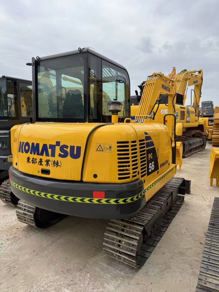 2020 Komatsu PC56 mini excavator, rear three-quarter view 2020 Komatsu PC56 mini excavator, rear three-quarter view