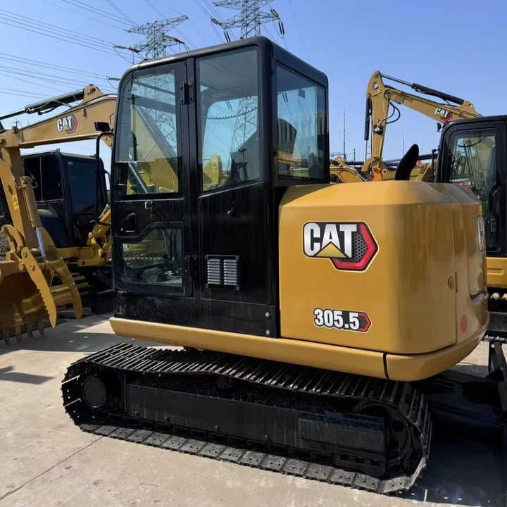 2023 Caterpillar 305.5 mini excavator, rear three-quarter view
