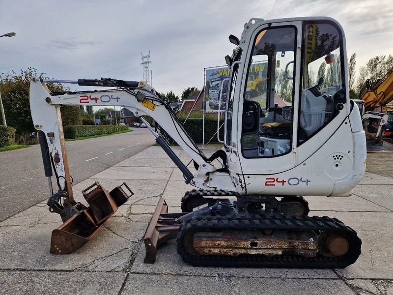 2011 Wacker Neuson 2404RD mini excavator, side view 2011 Wacker Neuson 2404RD mini excavator, side view