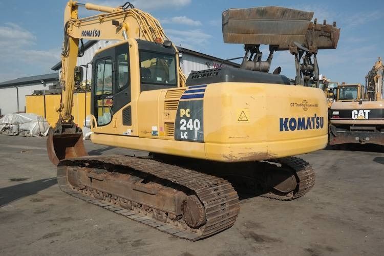 2006 Komatsu PC240LC crawler excavator, rear three-quarter view 2006 Komatsu PC240LC crawler excavator, rear three-quarter view