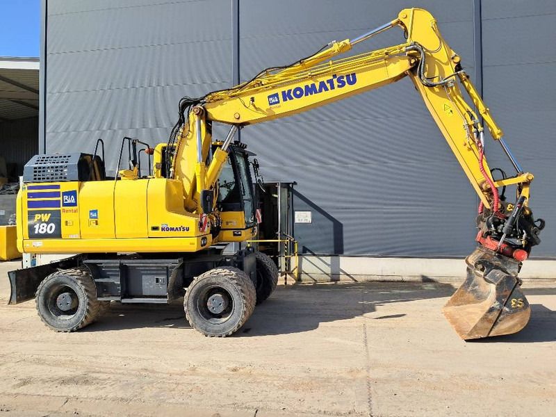 2023 Komatsu PW180-11E0 wheel excavator side view 2023 Komatsu PW180-11E0 wheel excavator side view