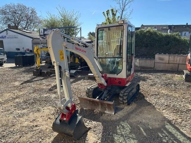 2023 Takeuchi TB216 V0 mini excavator, front three-quarter view 2023 Takeuchi TB216 V0 mini excavator, front three-quarter view
