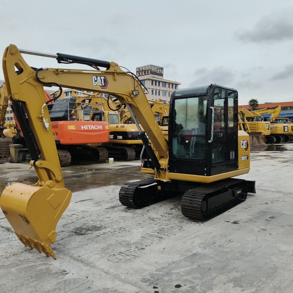 2023 Caterpillar 306E2 mini excavator, front three-quarter view 2023 Caterpillar 306E2 mini excavator, front three-quarter view