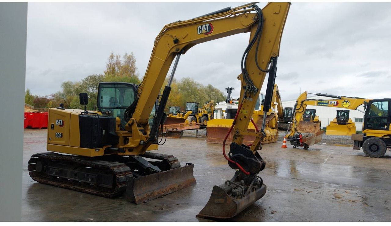 2022 Caterpillar 308-07CR crawler excavator, rear three-quarter view 2022 Caterpillar 308-07CR crawler excavator, rear three-quarter view