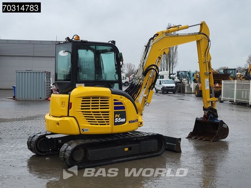 2024 Komatsu PC55MR-5 mini excavator, rear three-quarter view 2024 Komatsu PC55MR-5 mini excavator, rear three-quarter view