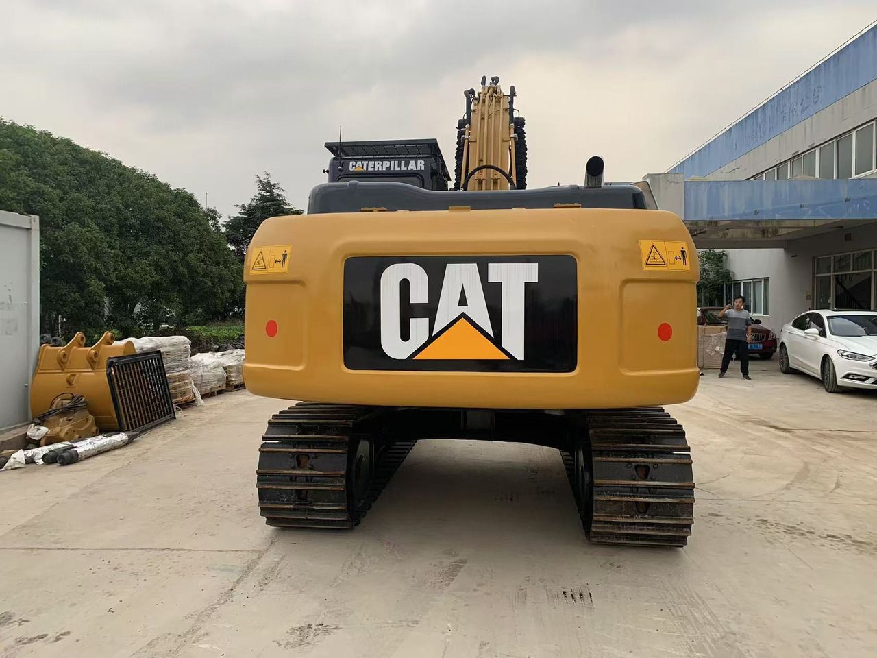 2023 Caterpillar 323 crawler excavator, rear view