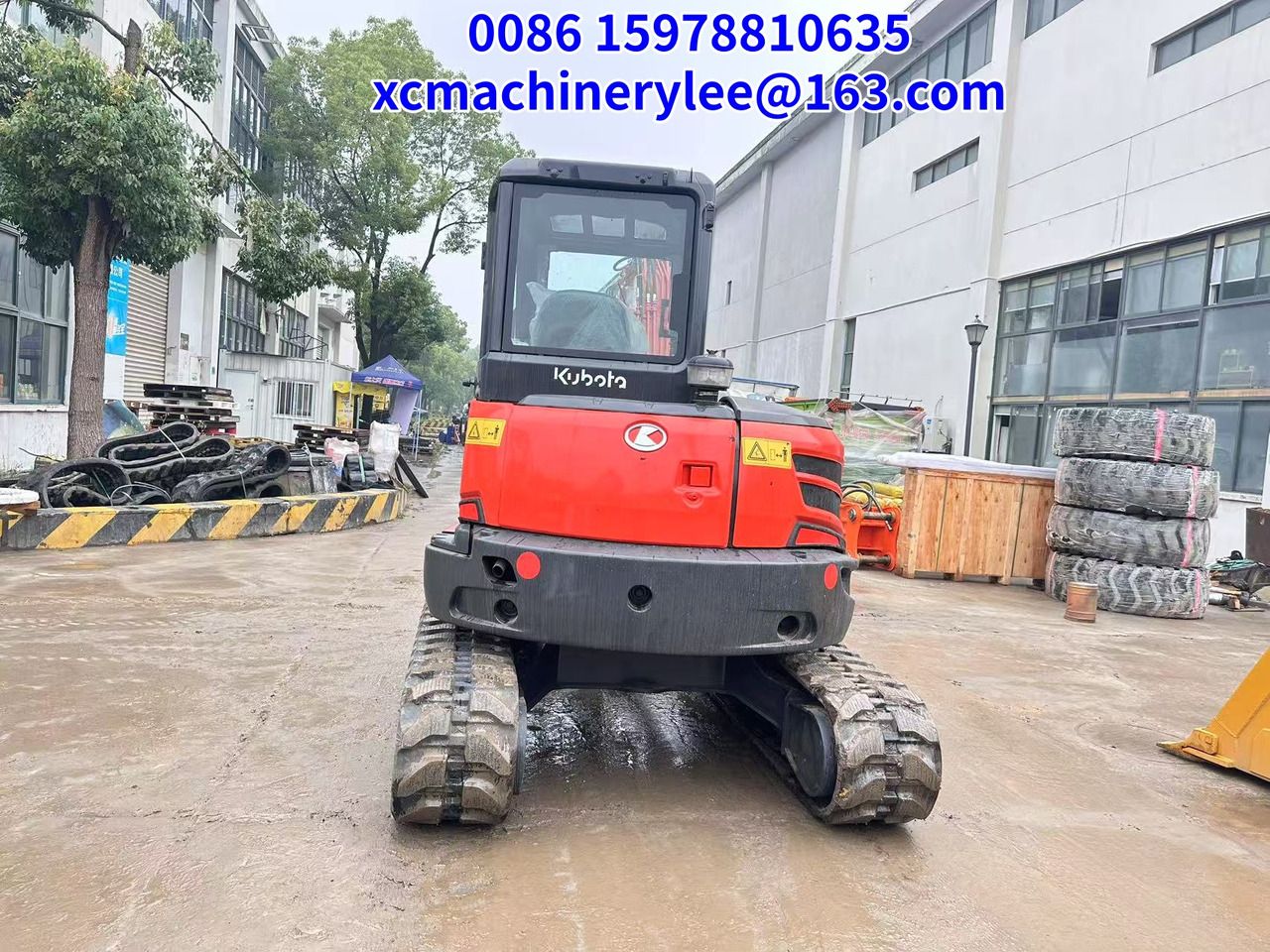 2023 Kubota KX057-4 mini excavator, rear view