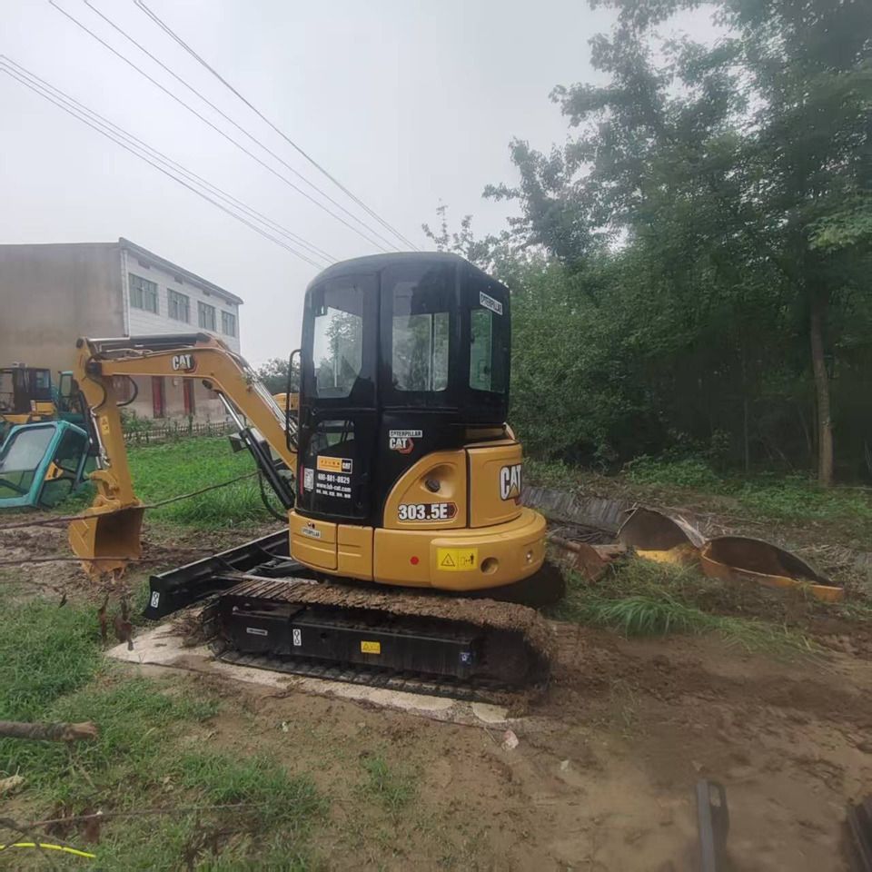 2021 Caterpillar 303.5E mini excavator, rear three-quarter view 2021 Caterpillar 303.5E mini excavator, rear three-quarter view