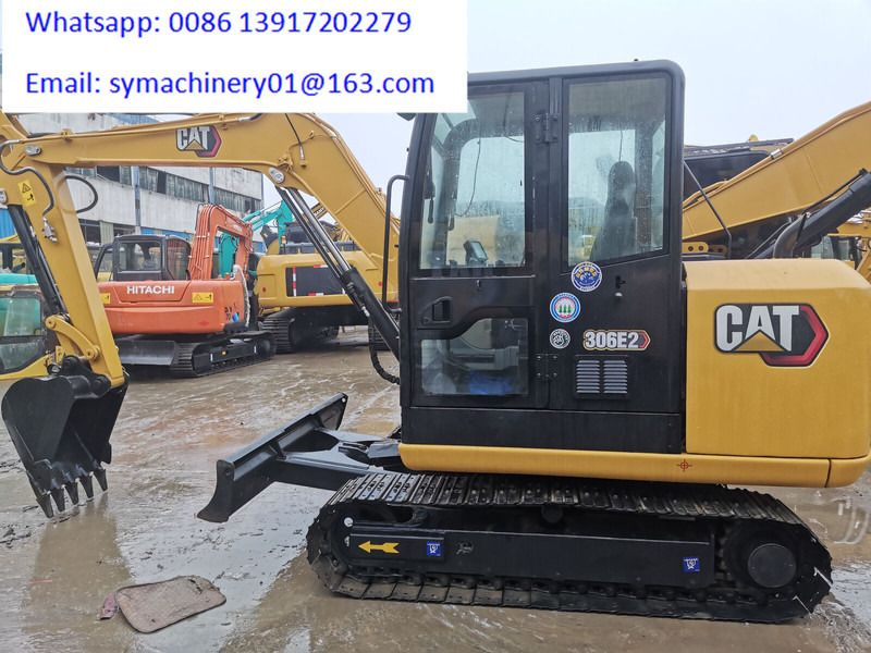 2023 Caterpillar 306E2 mini excavator side view 2023 Caterpillar 306E2 mini excavator side view