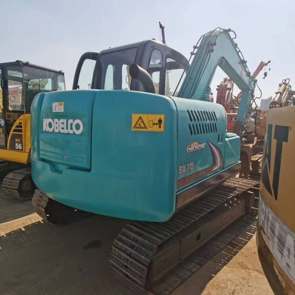Kobelco SK75 mini excavator, rear three-quarter view