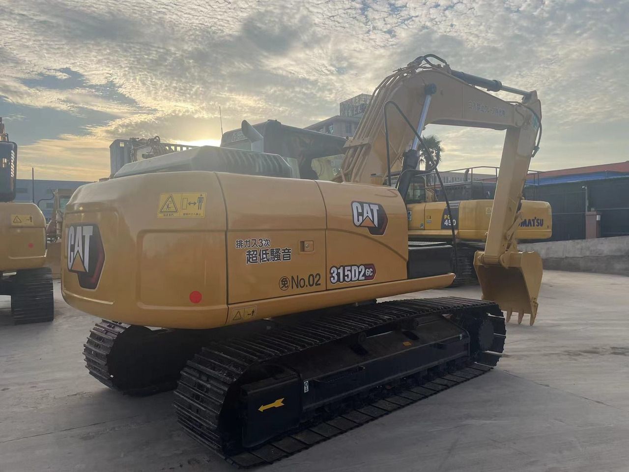 2024 Caterpillar 315D2 GC crawler excavator, rear three-quarter view