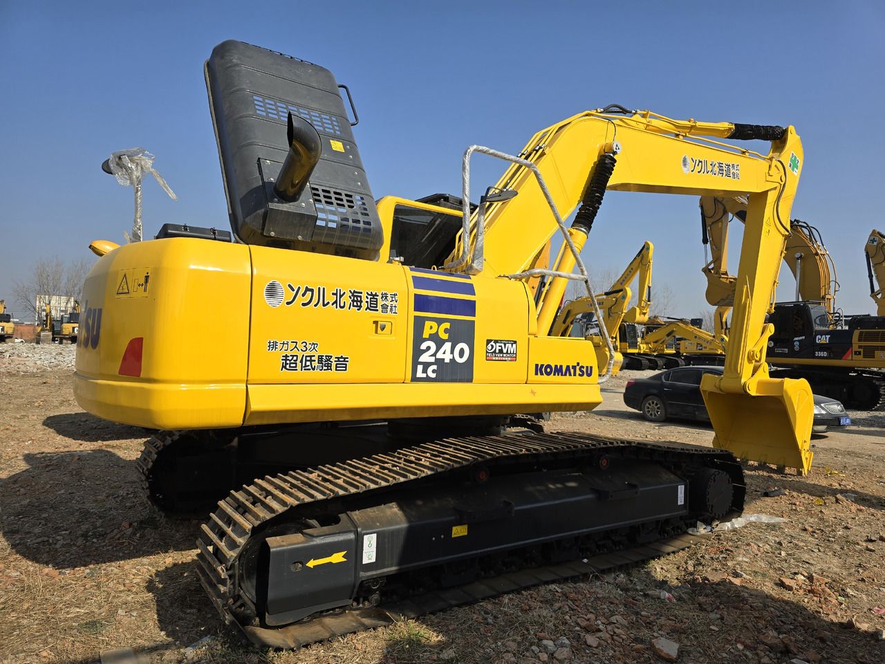 2024 Komatsu PC240LC-8 crawler excavator, rear three-quarter view 2024 Komatsu PC240LC-8 crawler excavator, rear three-quarter view