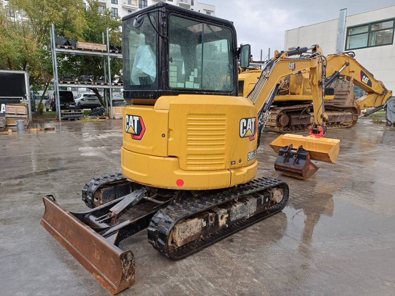 2020 Caterpillar 303.5ECR crawler excavator, rear three-quarter view 2020 Caterpillar 303.5ECR crawler excavator, rear three-quarter view
