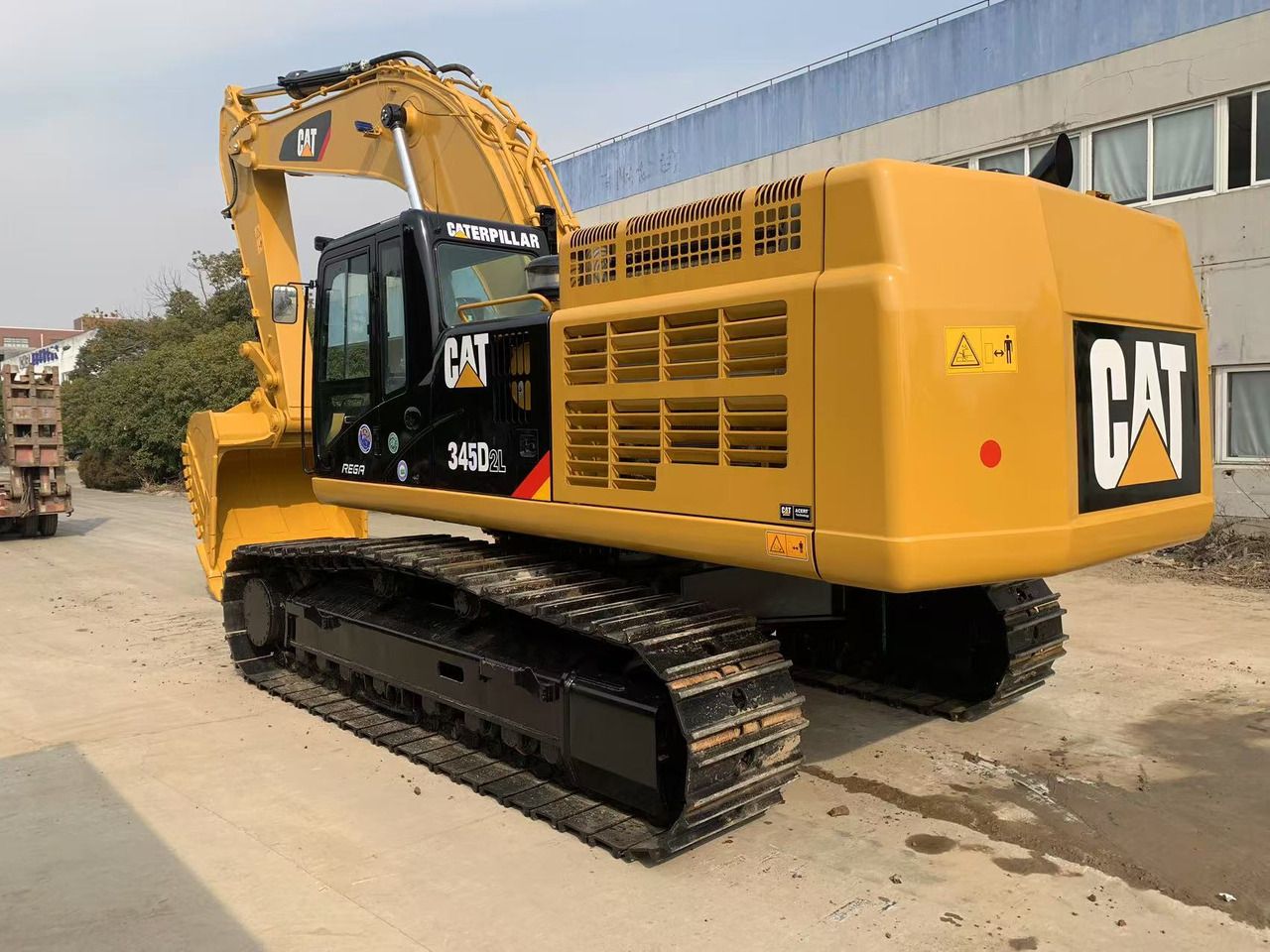 2023 Caterpillar 345D2L crawler excavator, rear three-quarter view 2023 Caterpillar 345D2L crawler excavator, rear three-quarter view