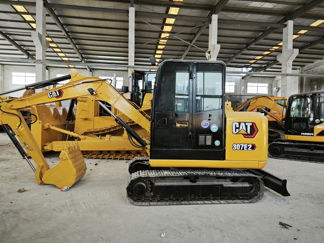 Caterpillar 307E2 mini excavator, side view