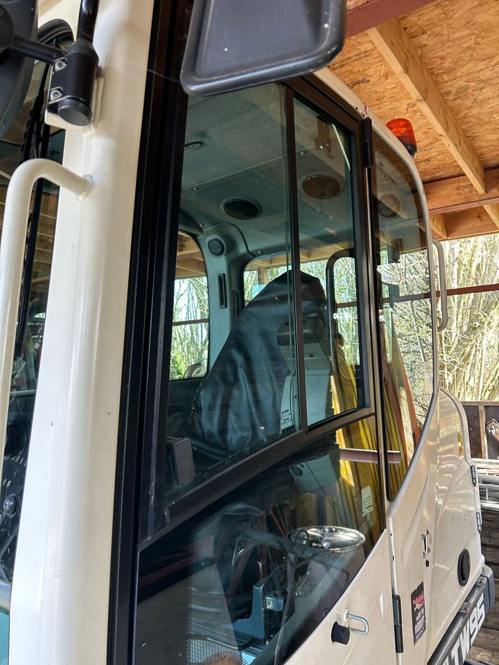 2017 Schaeff TW95 wheel excavator cab side view 2017 Schaeff TW95 wheel excavator cab side view