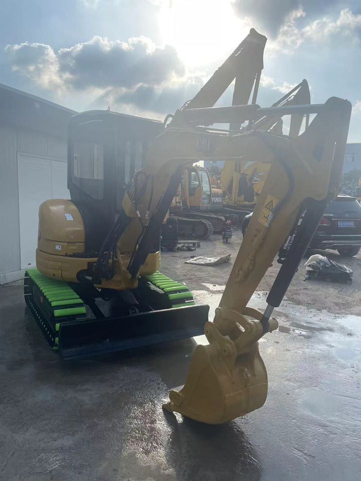 2020 Caterpillar 303E mini excavator, front three-quarter view 2020 Caterpillar 303E mini excavator, front three-quarter view