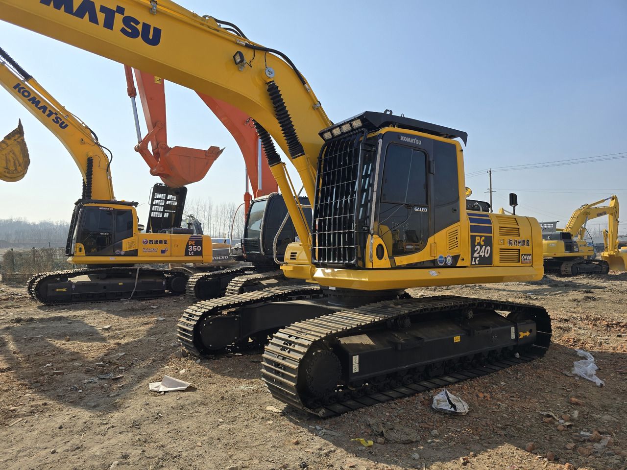 2025 Komatsu PC240-8 crawler excavator, front three-quarter view 2025 Komatsu PC240-8 crawler excavator, front three-quarter view