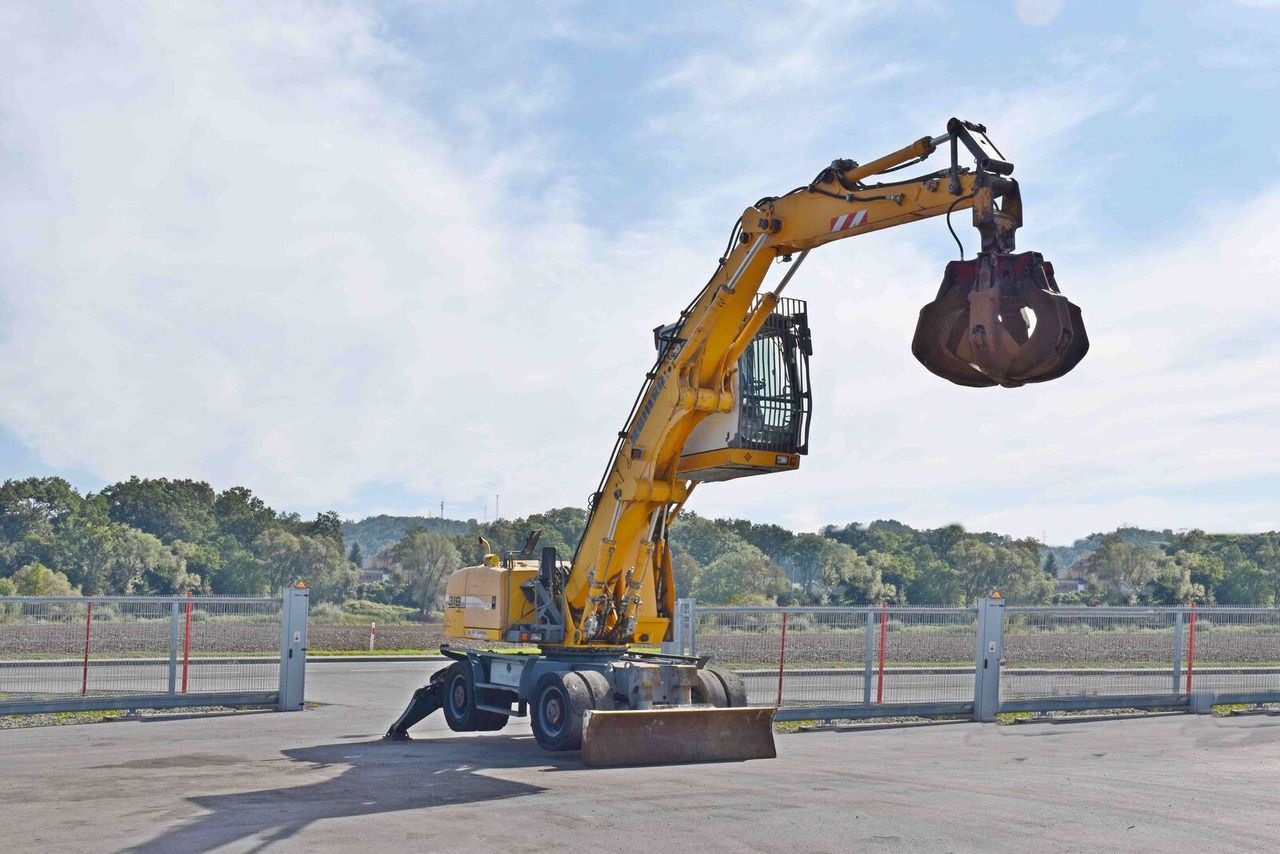 2008 Liebherr A316 material handler, side view 2008 Liebherr A316 material handler, side view
