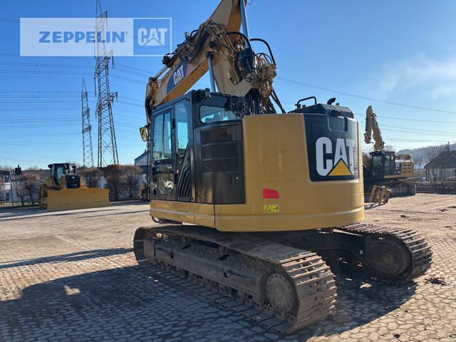 2016 Caterpillar 325FL crawler excavator, rear three-quarter view 2016 Caterpillar 325FL crawler excavator, rear three-quarter view