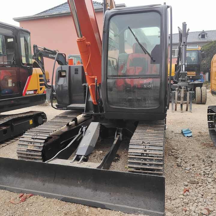 Hitachi ZX70 crawler excavator, front view with blade Hitachi ZX70 crawler excavator, front view with blade