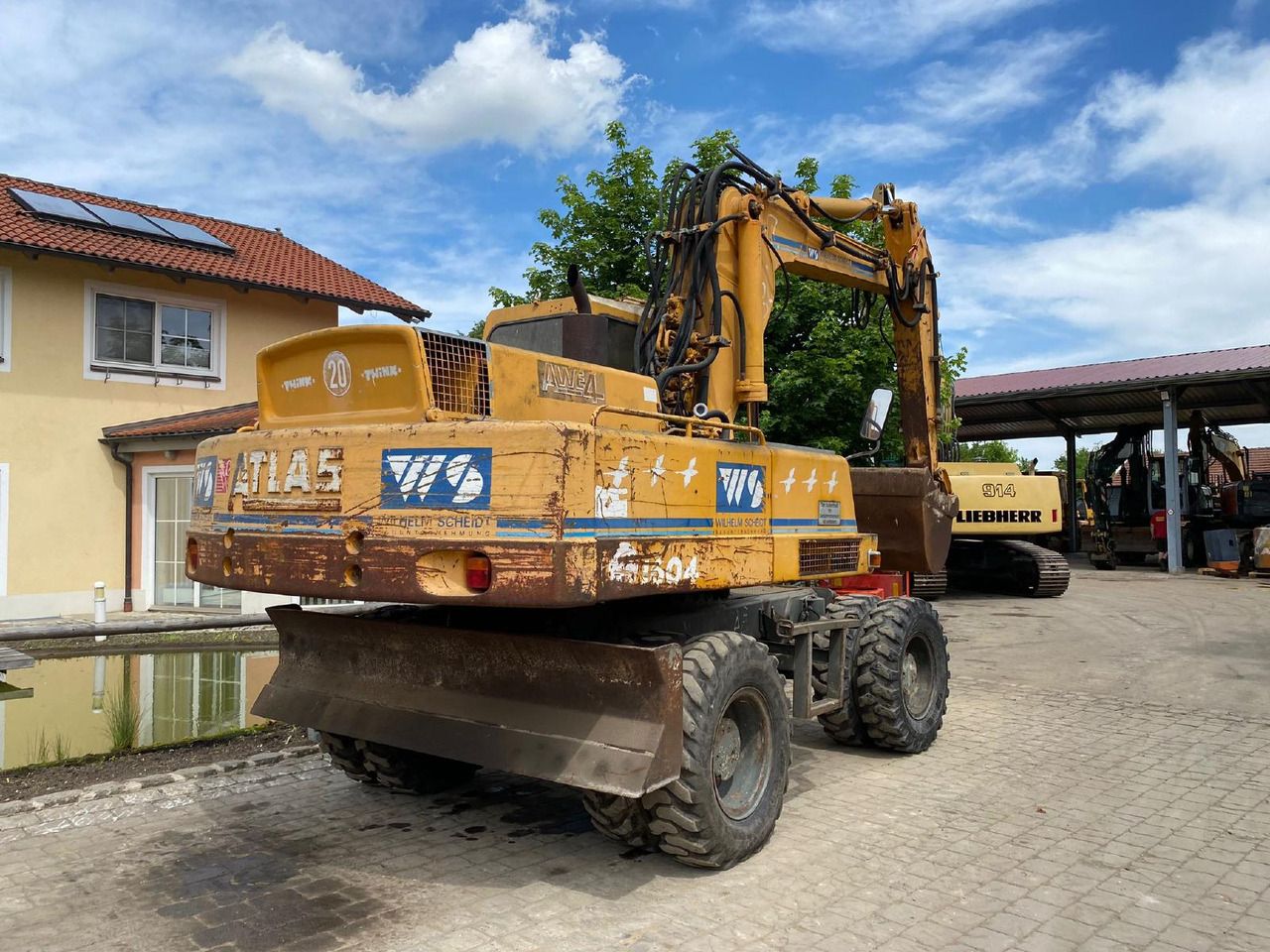 1992 Atlas AB 1604 wheel excavator, rear three-quarter view 1992 Atlas AB 1604 wheel excavator, rear three-quarter view