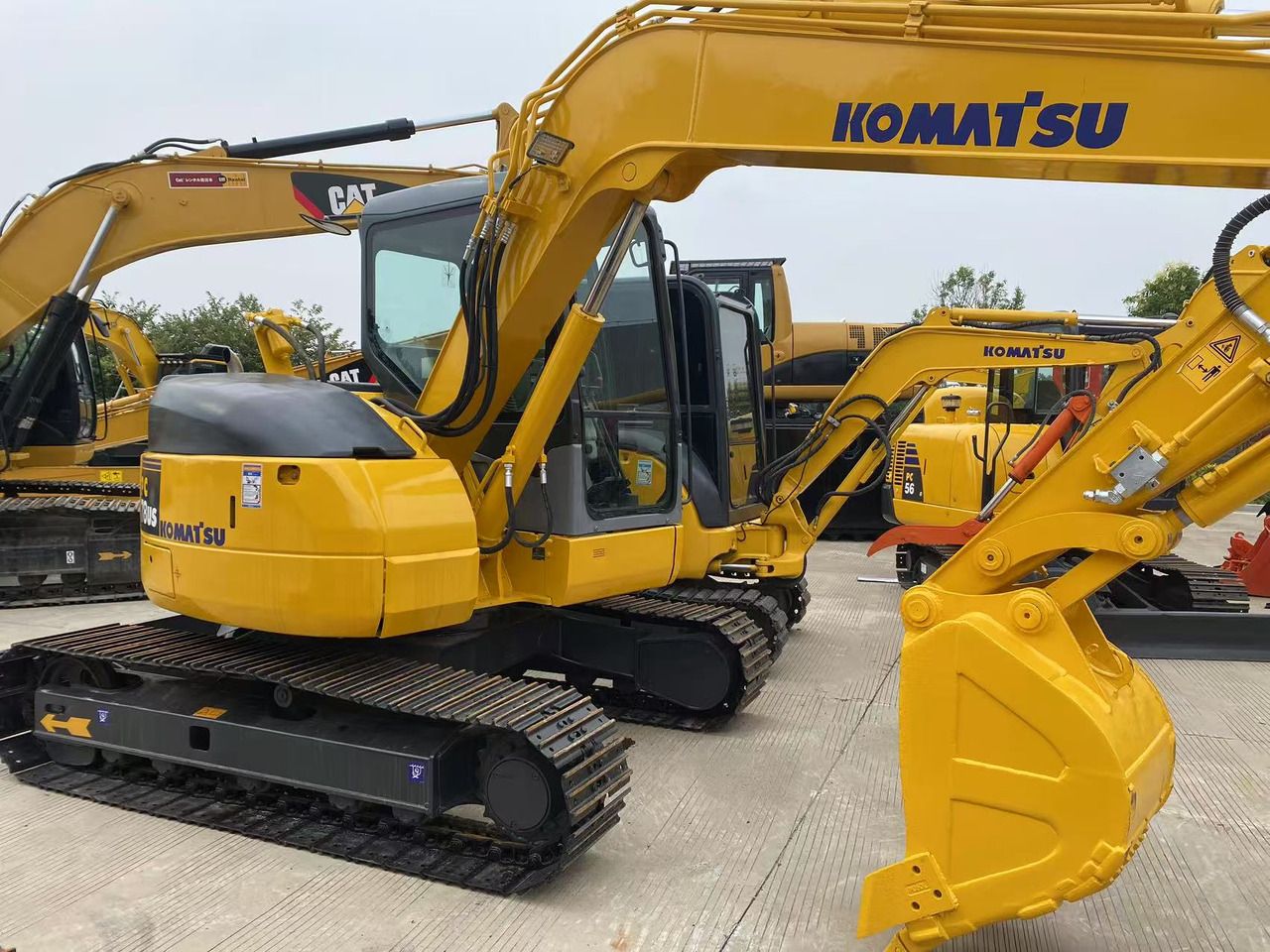 2022 Komatsu PC78US mini excavator, rear three-quarter view 2022 Komatsu PC78US mini excavator, rear three-quarter view
