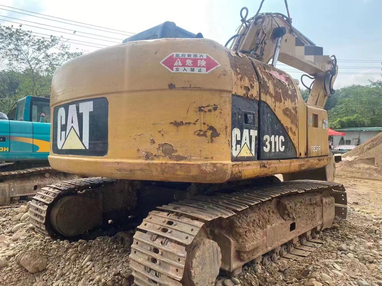 2022 Caterpillar 311C crawler excavator, rear three-quarter view