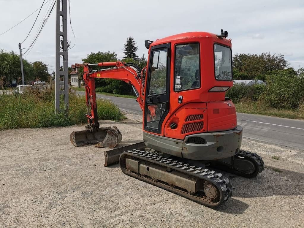 2010 Kubota U35-3 mini excavator, rear three-quarter view 2010 Kubota U35-3 mini excavator, rear three-quarter view